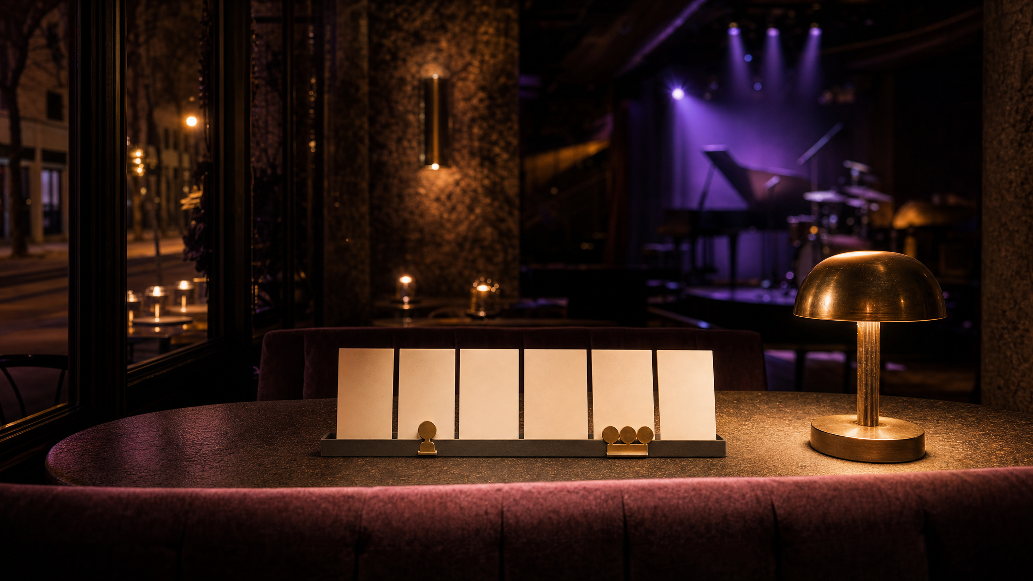 Six unbranded selection cards with a small highlighted shortlist on a jazz bar table